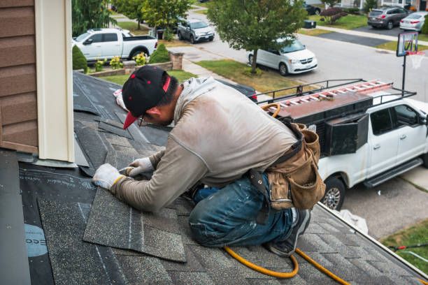 Professional Roof Replacement technician working in Henryville, PA